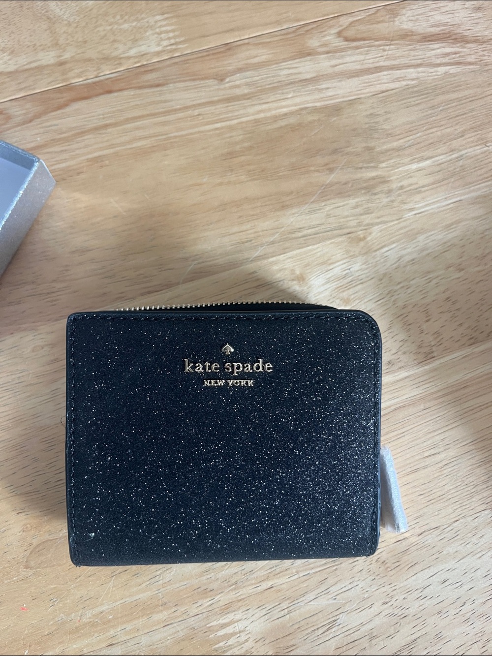 kate spade glitter black leather compact cardholder with gold logo